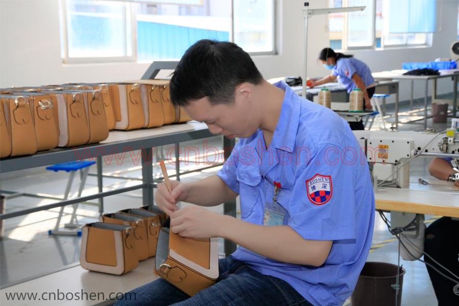 Which one is more important between efficiency and quality for Guangzhou Leather Goods Manufacturer?